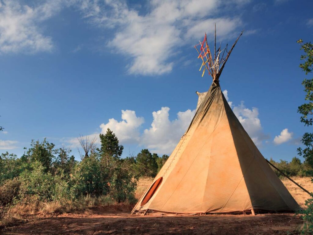 Sleeping in a Teepee is one of the bucket list ideas for adrenaline junkies
