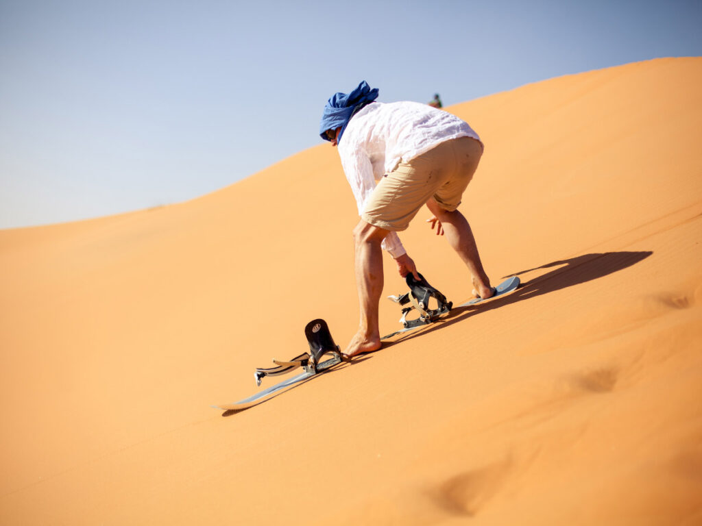 Sandboarding is one of the crazy ideas for a bucket list
