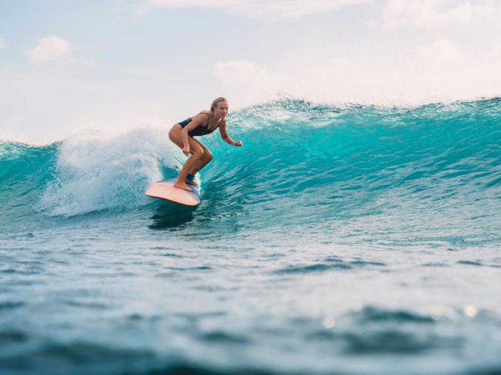 surfing is one of the crazy bucket list ideas